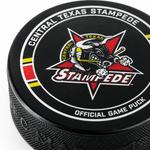 Detail view of the Stampede Hockey Puck on white background
